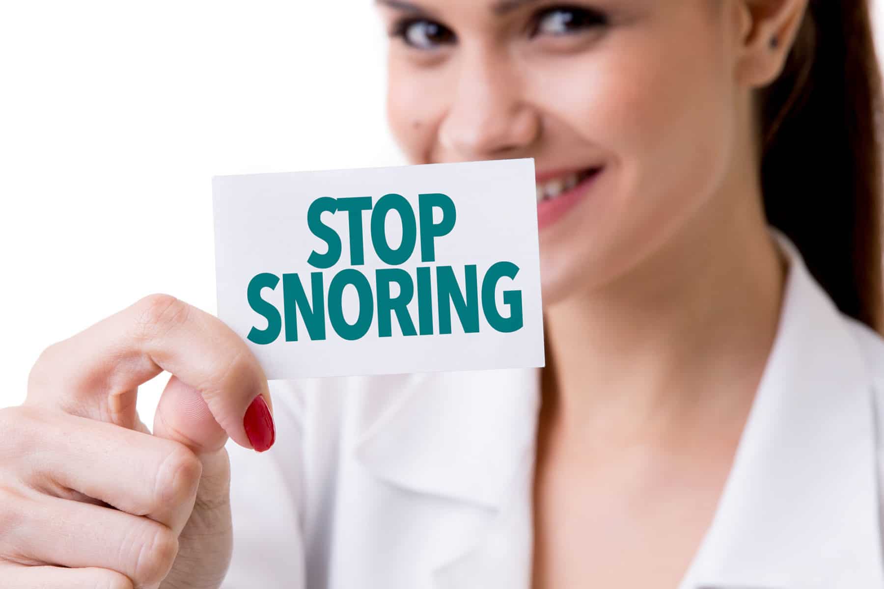 Stop Snoring - Women holding card.