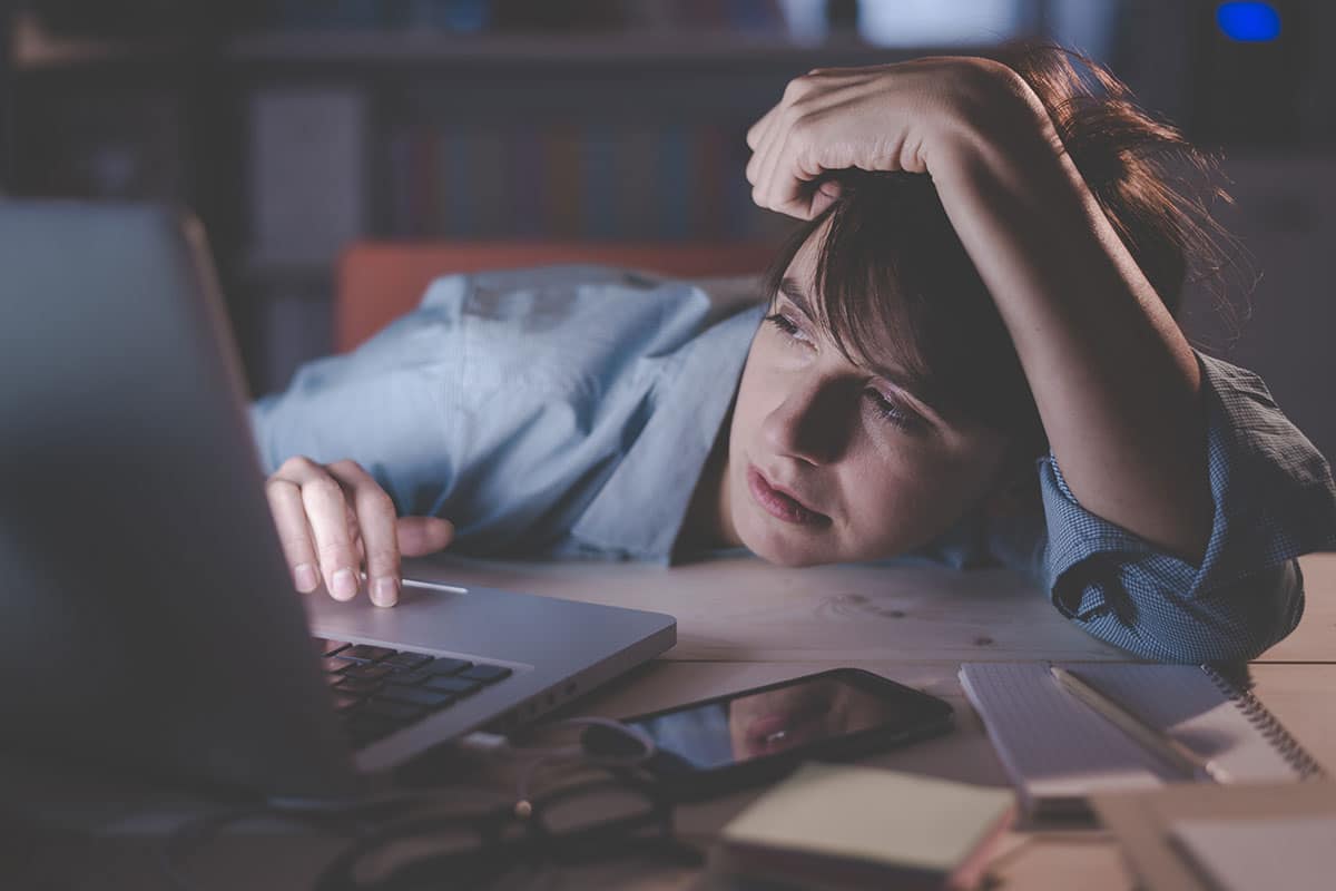 Women experiencing sleep deprivation effects